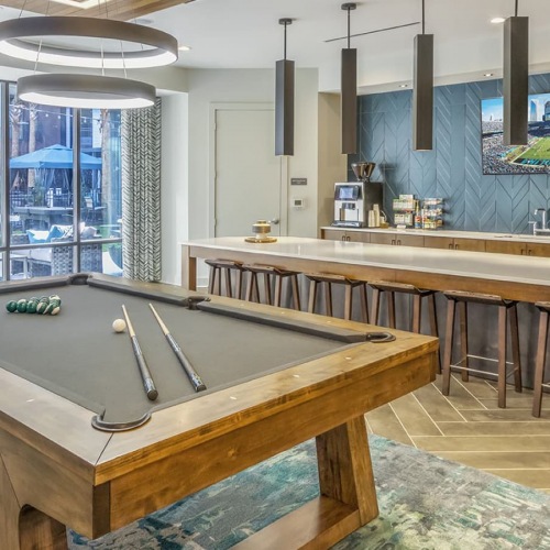 Clubroom spacious clubroom with a pool tab and a dining area